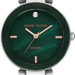 ساعت مچی زنانه Anne Klein با صفحه صدفی سبز و الماس اصل، بند استیل نقره‌ای