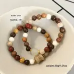 ست دستبند بافتنی زنانه و مردانه طرح اسکلت و گربه ۲ عددی
