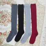 جوراب شلواری ساق بلند گرم‌کننده بافتی طرح راه‌راه