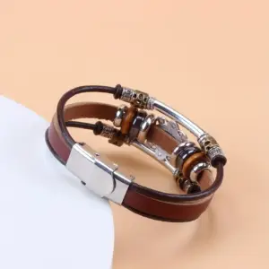 دستبند چرمی طرح وینتیج سبز فیروزه‌ای با مهره و سگک استیل