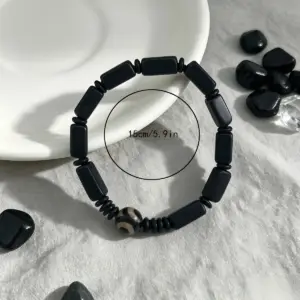 دستبند مهره‌ای مربع مشکی آویز چشم‌نظر طرح وینتیج