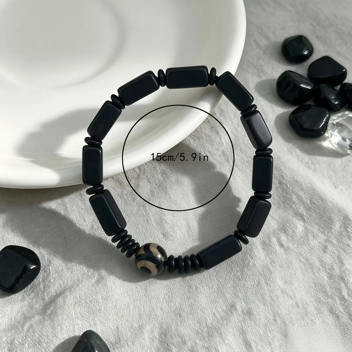 دستبند مهرهای مربع مشکی آویز چشمنظر طرح وینتیج دستبند مهرهای مربع مشکی آویز چشمنظر طرح وینتیج