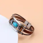دستبند چرمی طرح وینتیج سبز فیروزه‌ای با مهره و سگک استیل